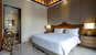 Villa Kailasha - king bed and ensuite bathroom